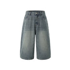 Jeans courts déchirés : La coupe droite urbaine