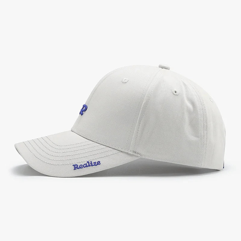 Casquette de baseball brodée du logo « Realize » R
