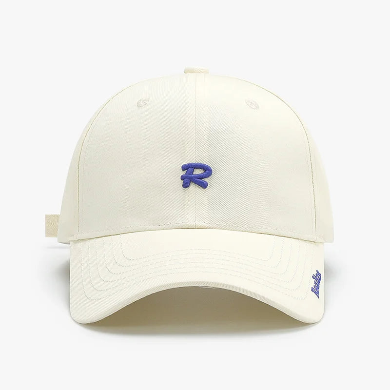 Casquette de baseball brodée du logo « Realize » R