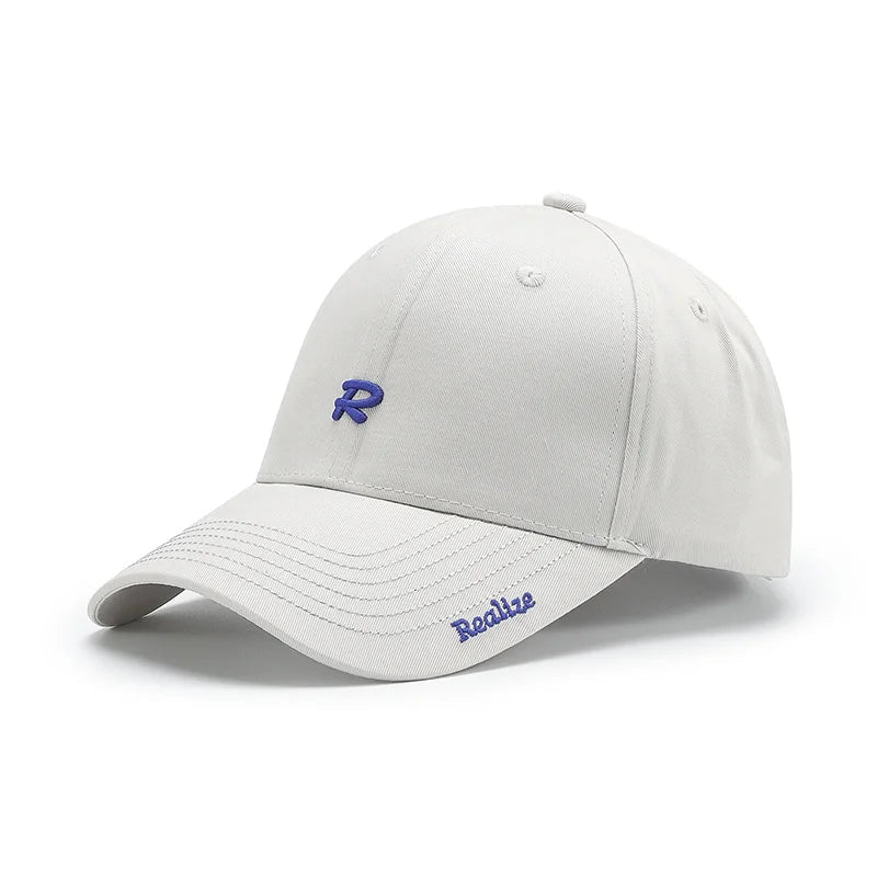 Casquette de baseball brodée du logo « Realize » R