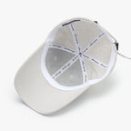 Casquette de baseball brodée du logo « Realize » R