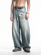 Pantalon en jean vintage délavé à jambes incurvées
