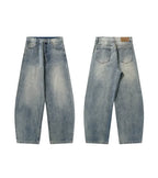 Pantalon en jean vintage délavé à jambes incurvées