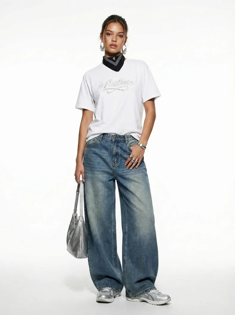 Pantalon en jean vintage délavé à jambes incurvées
