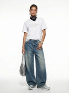 Pantalon en jean vintage délavé à jambes incurvées