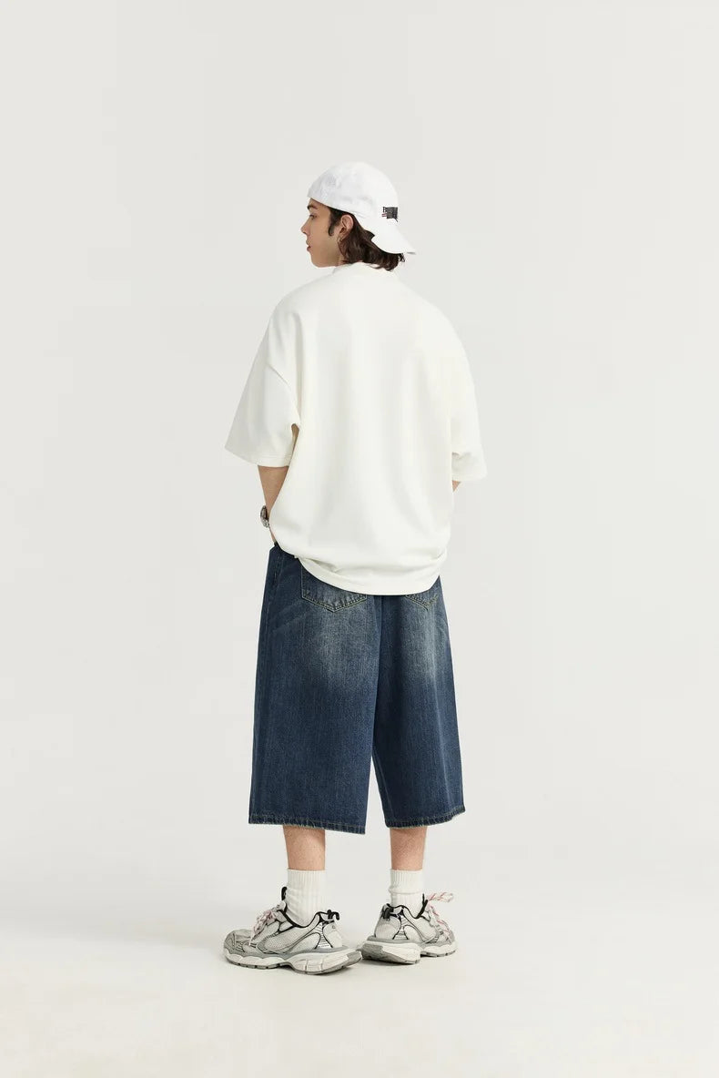 Jean unisexe en denim délavé, coupe courte et jambe large