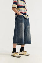Jean unisexe en denim délavé, coupe courte et jambe large