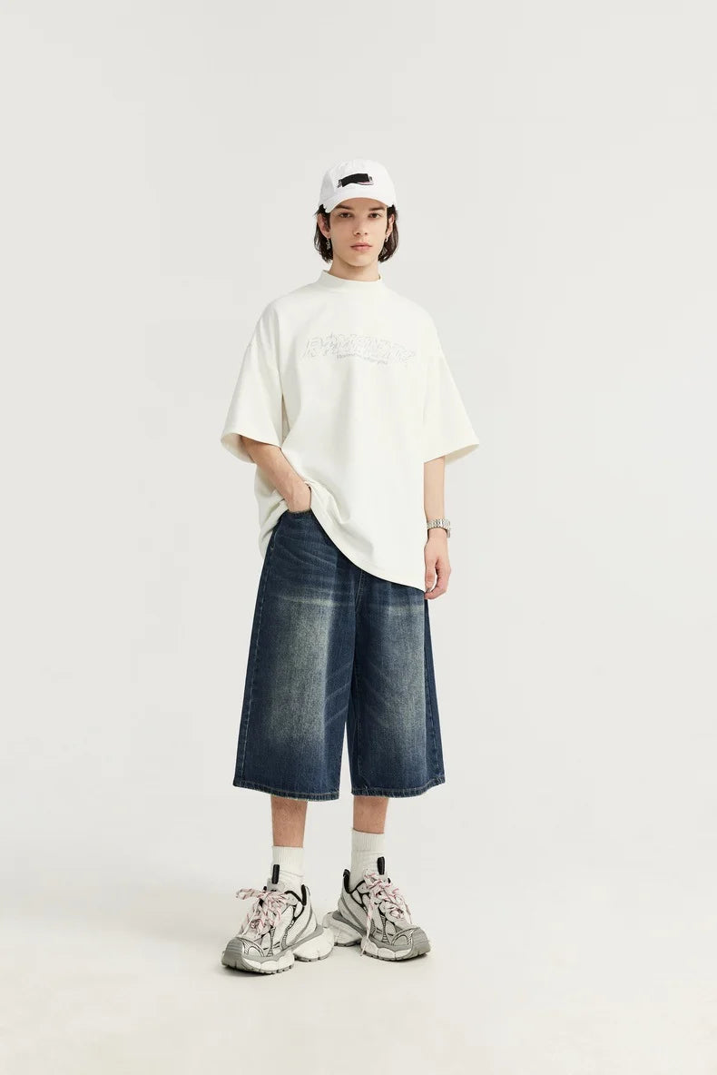 Jean unisexe en denim délavé, coupe courte et jambe large